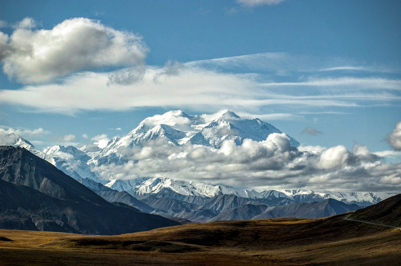 Mountain peaks rising above the clouds